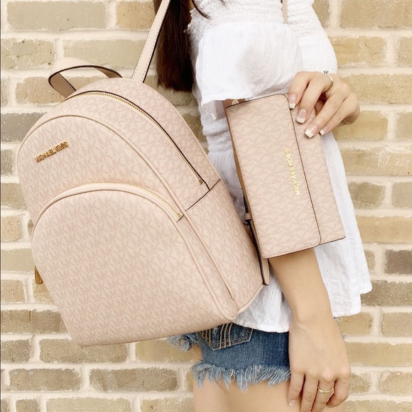 Michael Kors Handbags - Gaby’sBags-Michael Kors Backpack&Wallet SET